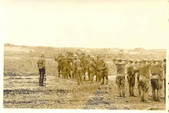 Russian POWs, German guard with PPSh